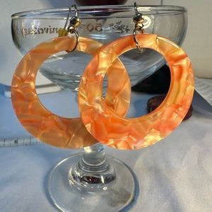 Orange open center hoop earrings